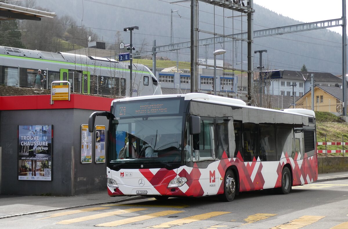 (285'244) - CarPostal Ouest - JU 52'455/PID 11'331 - Solaris am 6. M�rz 2026 beim Bahnhof Moutier