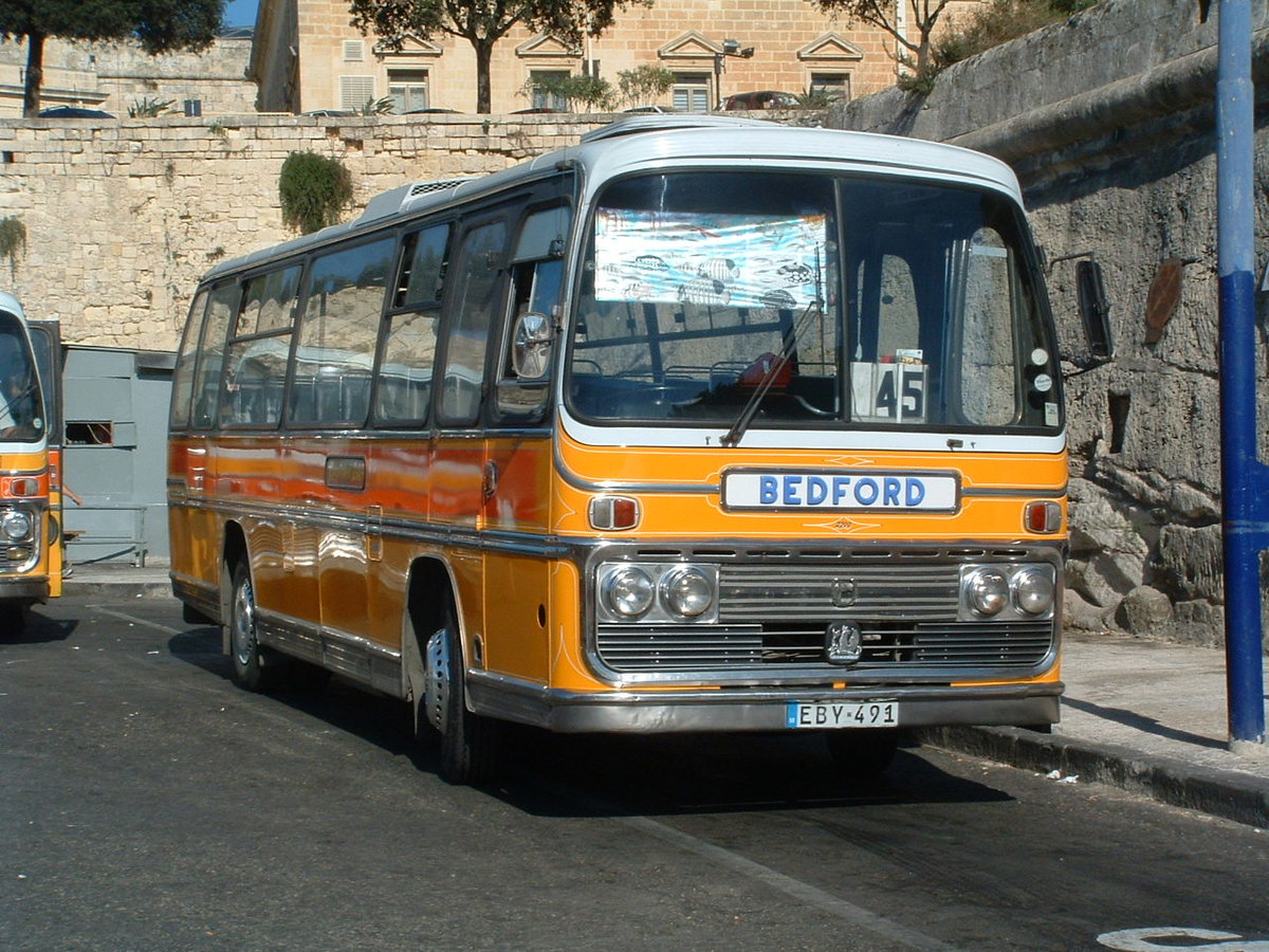 EBY 491 (Formerly Y-0491)
1975 Bedford YRQ
Plaxton Elite DP45F
New to Gypsy Queen, Langley Park, County Durham, UK registered LBR 270N

City Gate Bus Station, Valletta, Malta. 23rd September 2005