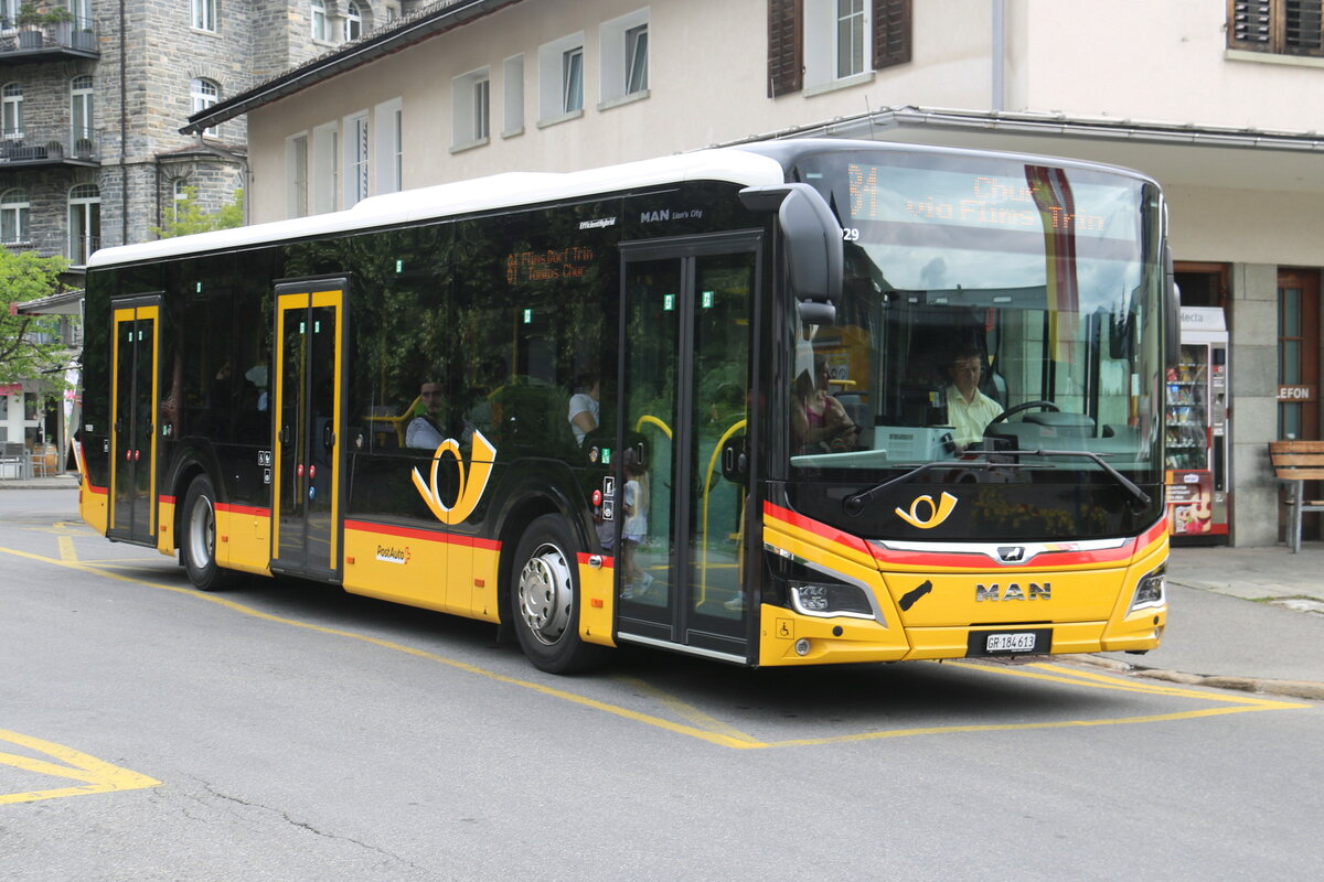 PostAuto Graub�nden - GR 184'613/PID 11'929 - MAN am 8. Juli 2023 in Flims (Aufnahme: Martin Beyer)