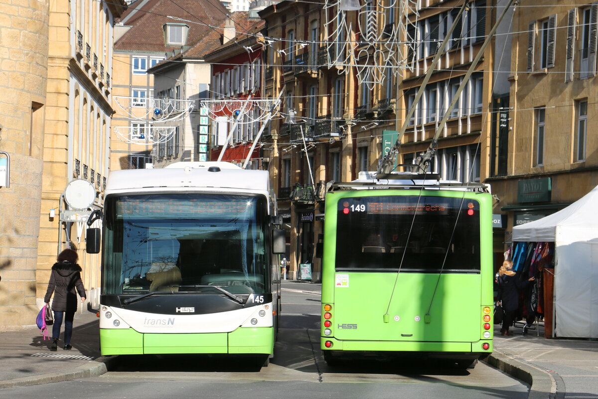 transN, La Chaux-de-Fonds - Nr. 145 - Hess/Hess Gelenktrolleybus (ex TN Neuch�tel Nr. 145) + Nr. 149 - Hess/Hess Gelenktrolleybus (ex TN Neuch�tel Nr. 149) am 15. Dezember 2023 in Neuch�tel, Place Pury (Aufnahme: Martin Beyer)