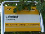 (208'553) - PostAuto-Haltestellenschild - Sch�nried, Bahnhof - am 5.