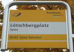 (130'307) - PostAuto-Haltestellenschild - Spiez, L�tschbergplatz - am 11.