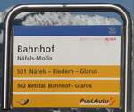 (214'203) - PostAuto/GLARNER BUS-Haltestellenschild - N�fels-Mollis, Bahnhof - am 15.