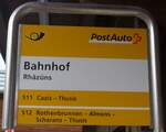 (184'808) - PostAuto-Haltestellenschild - Rh�z�ns, Bahnhof - am 16.